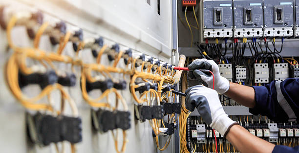 Professional Electrician technician working in Assumption, IL